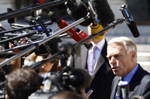 France's Prime Minister Jean-Marc Ayrault speaks to journalists after the weekly cabinet meeting at the Elysee Palace in Paris