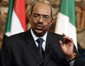 Sudan's President Omar al-Bashir gestures during a joint press conference with Italian Premier Romano Prodi, not seen, at the end of their meeting at Chigi palace, Premier's office, in Rome, Friday, Sept. 14, 2007. President Omar al-Bashir, who came to power in 1989 in a military and Islamic coup, arrived in Rome a few weeks before the expected deployment of an international peacekeeping force to try to improve the security situation in the war-ravaged western Sudanese region of Darfur. More than 200,000 people have died and 2.5 million have been uprooted since ethnic African rebels in Darfur took up arms against the Arab-dominated Sudanese government in 2003. (AP Photo/Gregorio Borgia)